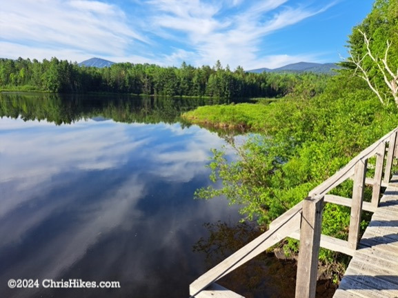 View of Sugarloaf Mountain across a pond.