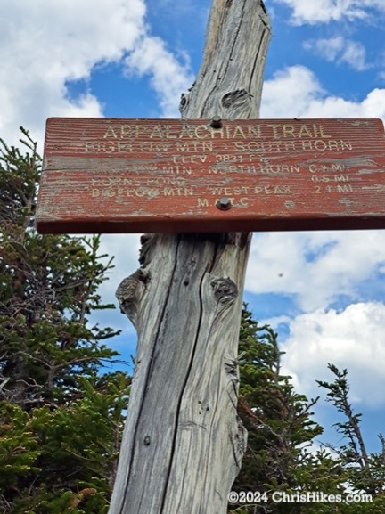 South Horn summit sign mounted on a post