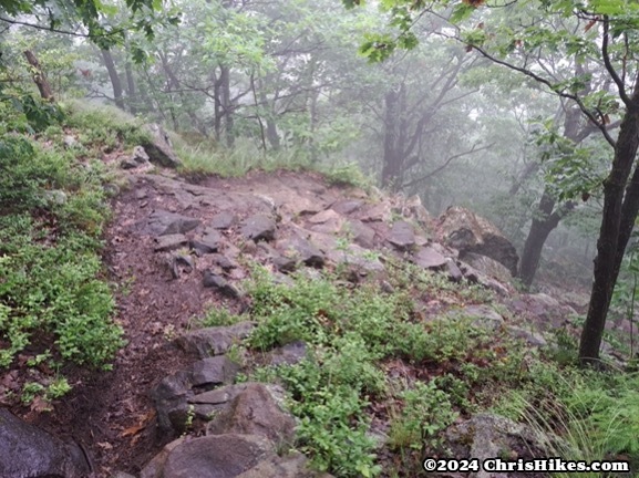 photograph of hiking trail descending a rocky area